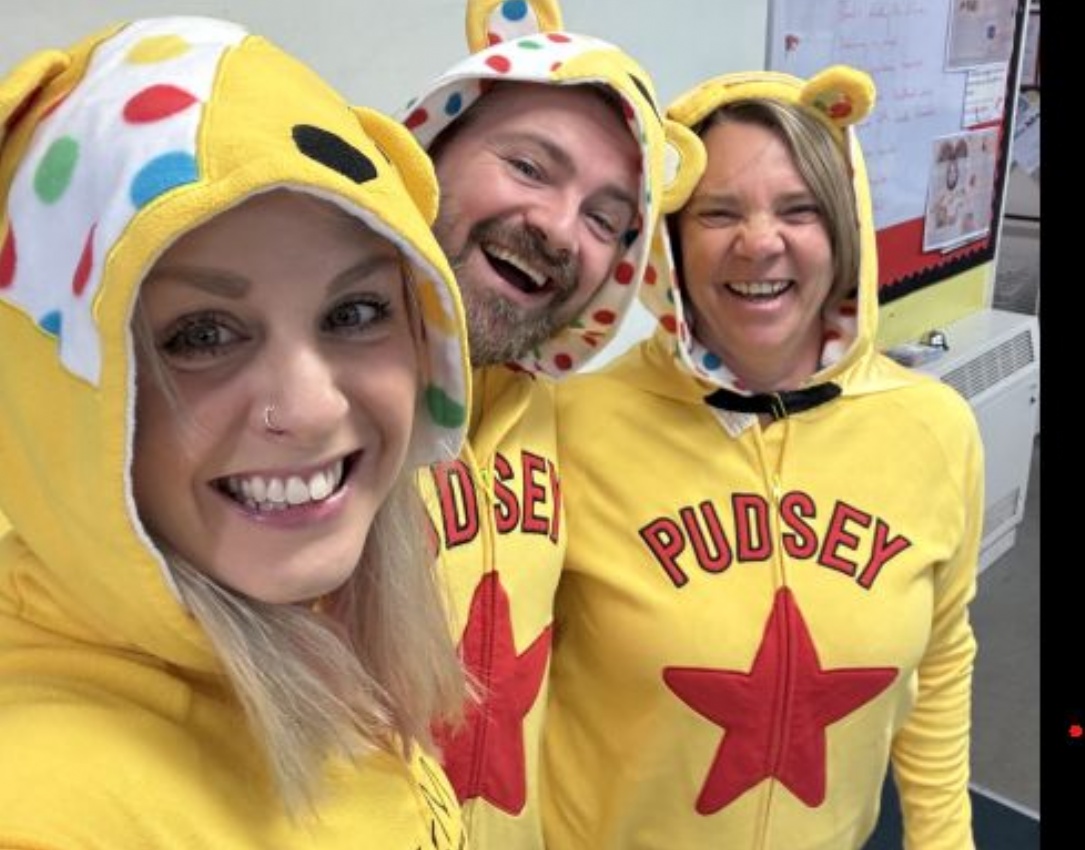 Picture showing 3 members of staff in Pudsey Bear costumes.